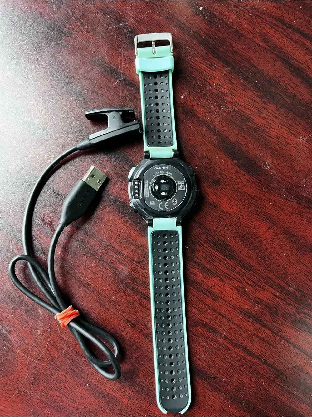 Garmin 235 Forerunner Smartwatch with Mint Green Perforated Band